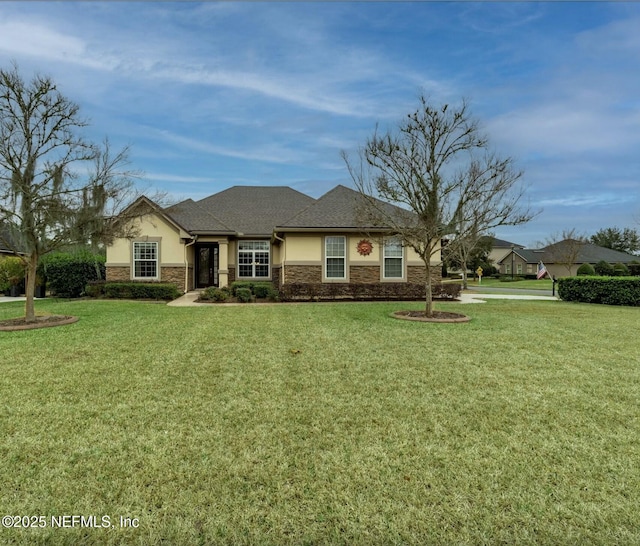 ranch-style house featuring a front lawn