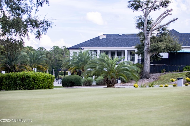 view of front of home with a yard