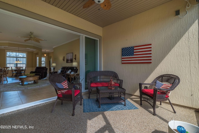 view of patio / terrace featuring ceiling fan