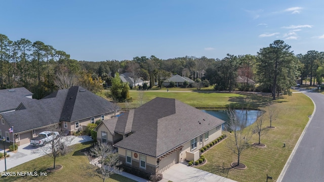 bird's eye view featuring a residential view and a water view