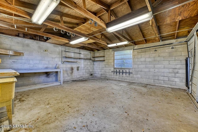 basement with a workshop area