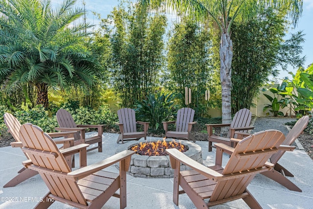 view of patio featuring an outdoor fire pit