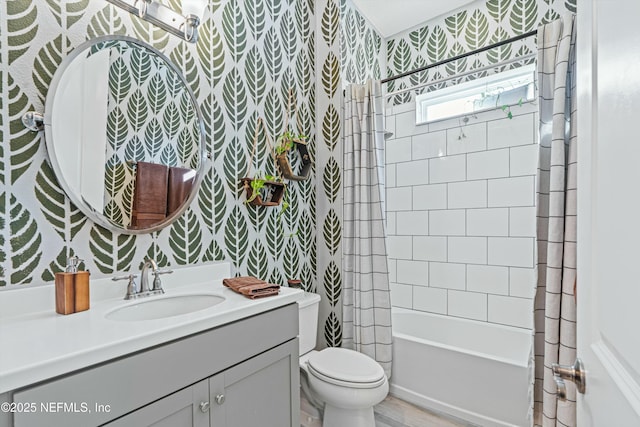 full bathroom with toilet, vanity, and shower / bathtub combination with curtain