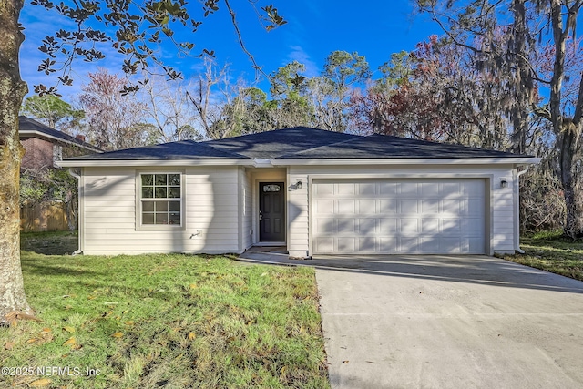 ranch-style house with a front yard and a garage