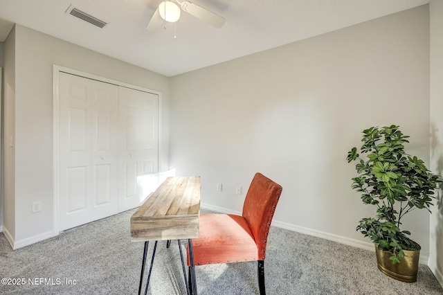 office area with ceiling fan and carpet floors