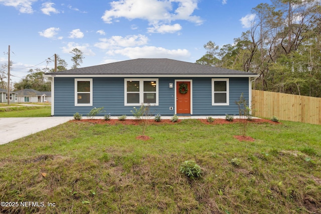 single story home with a front yard