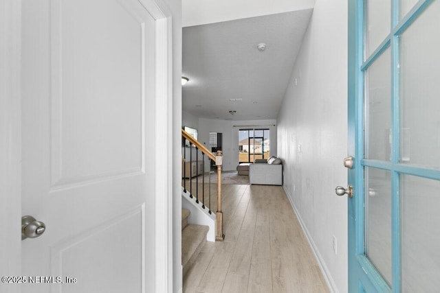 foyer with light wood-type flooring