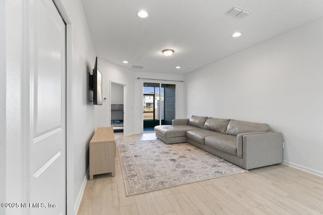 living room with light wood-type flooring