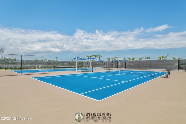 view of sport court with basketball hoop