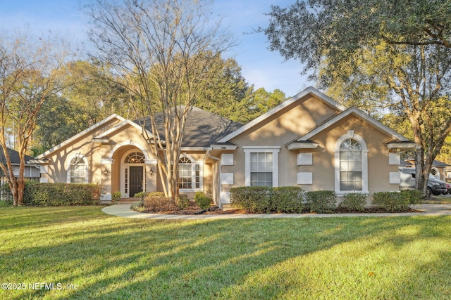 view of front of property with a front yard