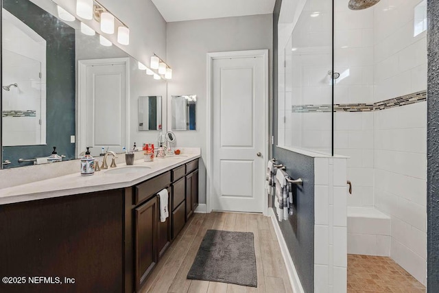 bathroom featuring vanity and walk in shower