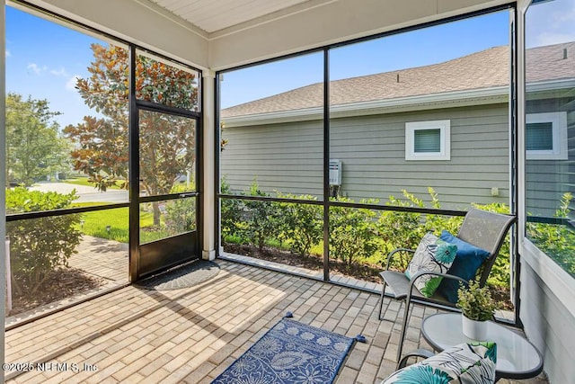 sunroom featuring a wealth of natural light