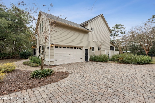 view of home's exterior featuring a garage