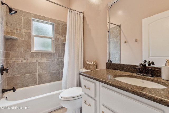 full bathroom featuring vanity, shower / bath combination with curtain, and toilet