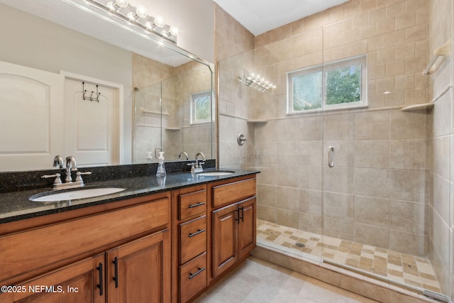 bathroom featuring vanity and walk in shower