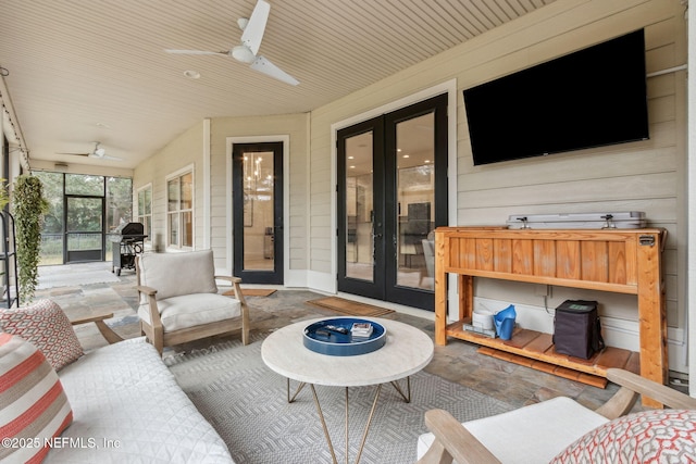 view of patio featuring french doors, area for grilling, and ceiling fan