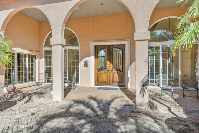 doorway to property featuring french doors