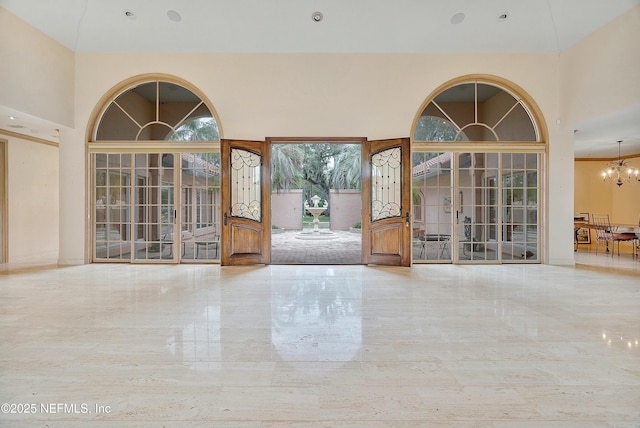 interior space featuring a chandelier