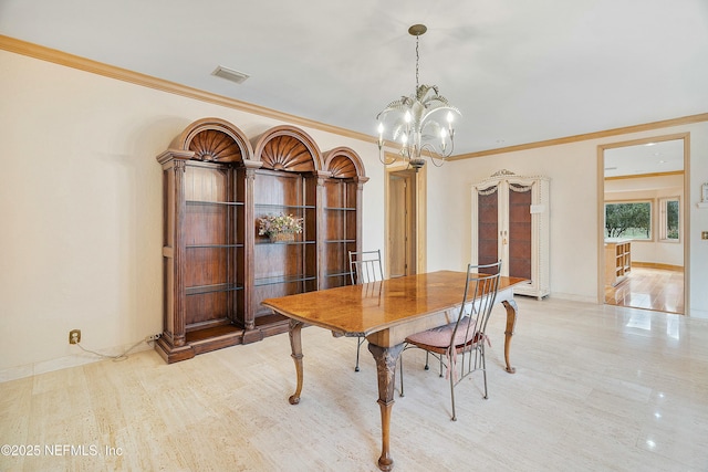 dining room featuring an inviting chandelier and ornamental molding