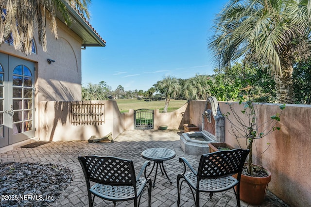 view of patio / terrace featuring french doors