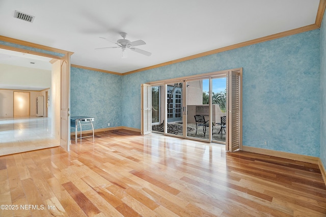 unfurnished room featuring crown molding, ceiling fan, and wood-type flooring