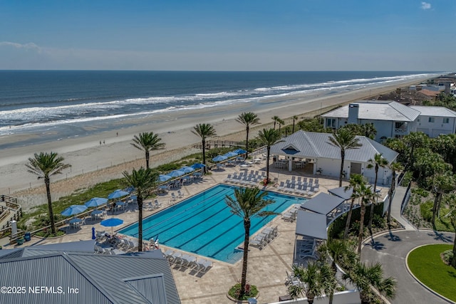 aerial view with a view of the beach and a water view