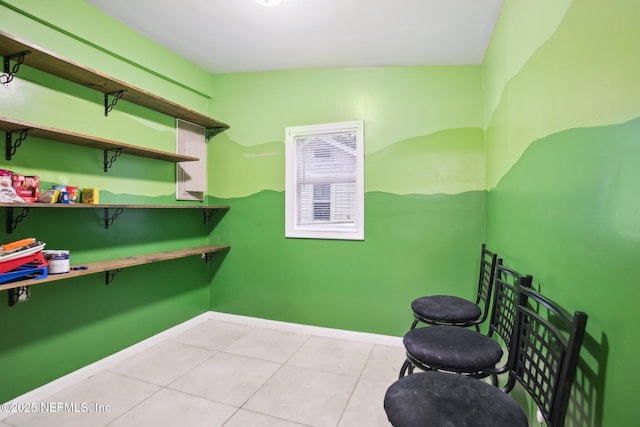 interior space featuring light tile patterned floors