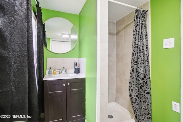 bathroom featuring vanity and a shower with curtain