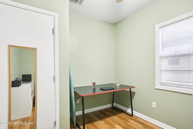 office space with hardwood / wood-style flooring