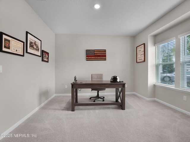 home office featuring light colored carpet