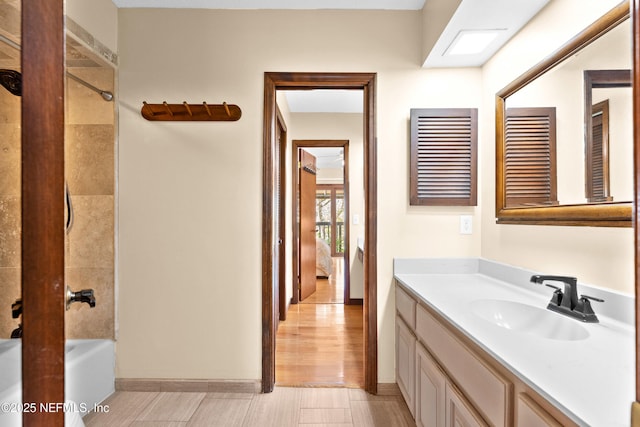 full bathroom featuring shower / tub combination and vanity