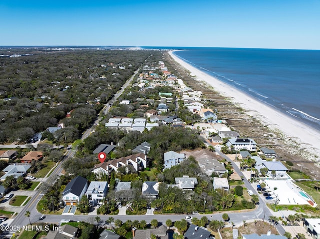 bird's eye view featuring a water view, a residential view, and a view of the beach