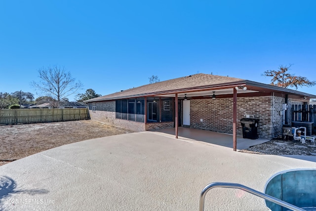 rear view of house featuring a patio area