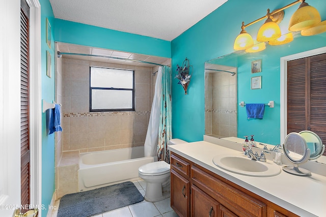 full bathroom with vanity, shower / bath combination with curtain, tile patterned flooring, toilet, and a textured ceiling