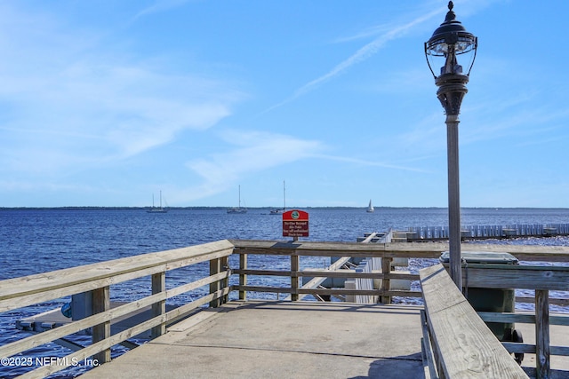 dock area featuring a water view