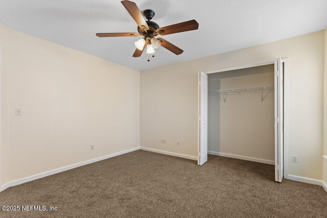 unfurnished bedroom with a closet, ceiling fan, and carpet floors