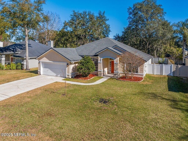 ranch-style home featuring a garage and a front yard