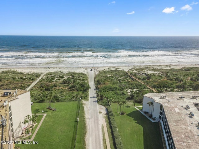 aerial view featuring a water view and a view of the beach