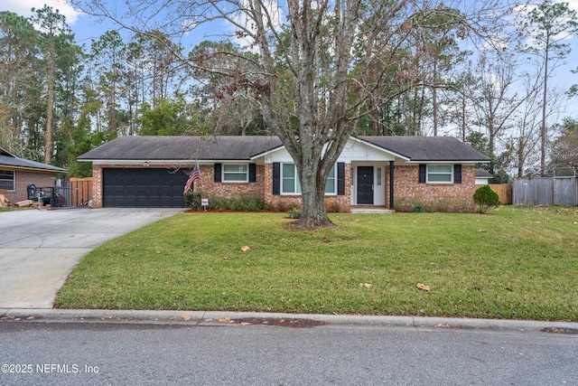 ranch-style house with a front lawn and a garage