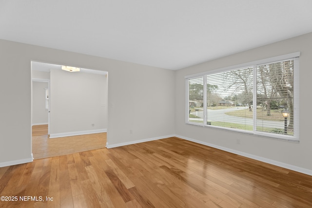 empty room featuring hardwood / wood-style floors