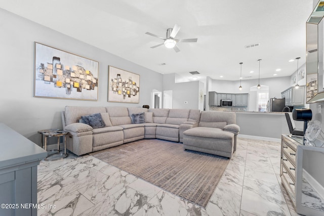 living room with ceiling fan