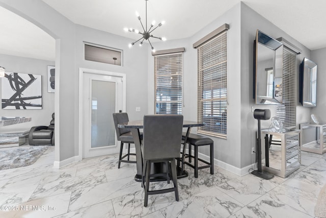 dining room featuring a chandelier