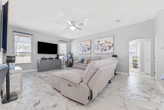 living room with ceiling fan