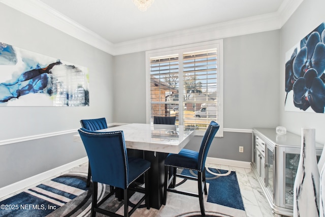 dining area with crown molding