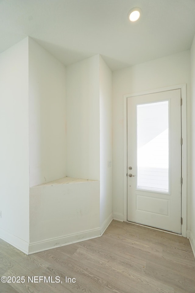 entryway with light wood-type flooring