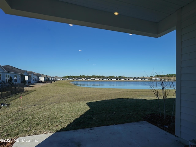 view of yard with a water view