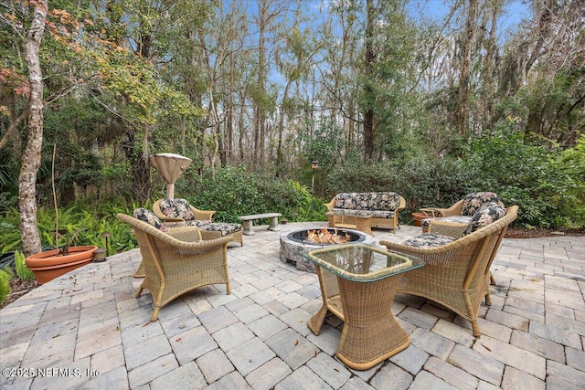 view of patio / terrace featuring a fire pit