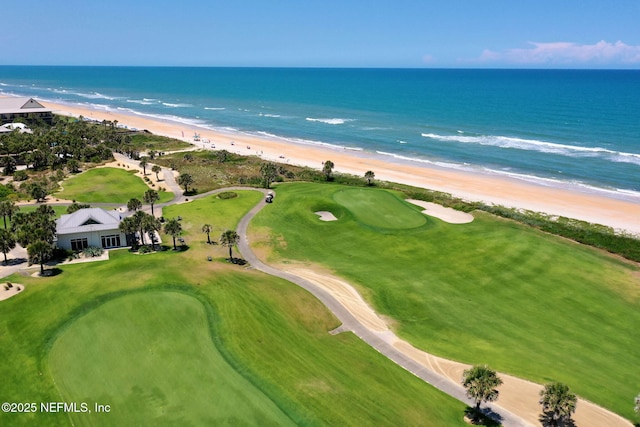 bird's eye view with a view of the beach and a water view