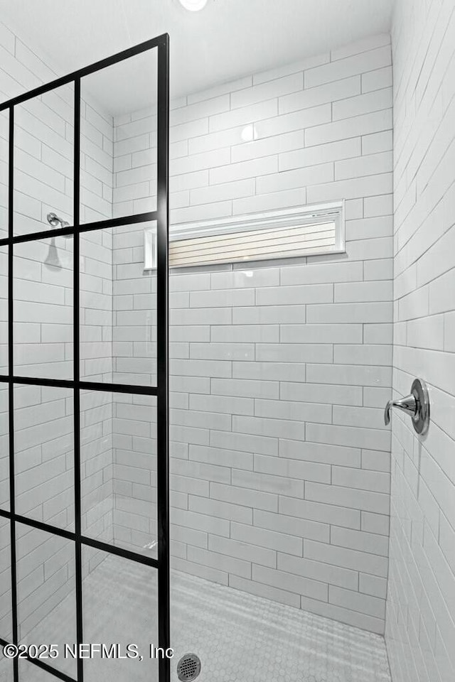 room details with a tile shower