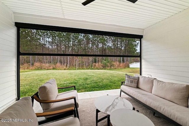 view of patio with ceiling fan and outdoor lounge area